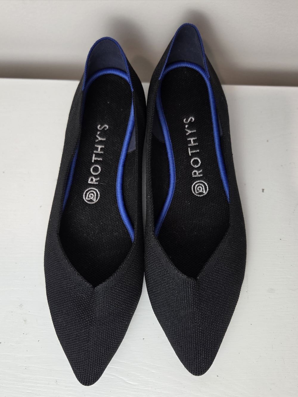 Rothy's Black Pointed Knit Flats with Royal Blue Trim